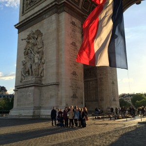 Standing beneath the Arc de Triomphe